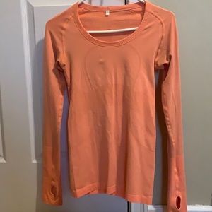 Orange lululemon long sleeved top
